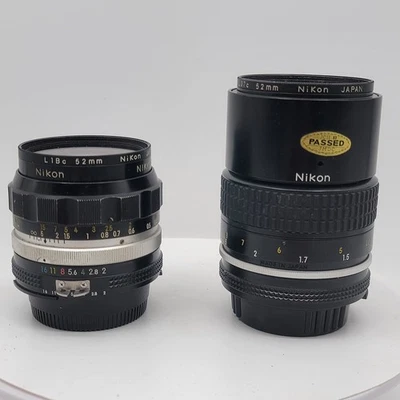 Lote de 2 lentes de enfoque manual Nikon Nikkor vintage - 35 mm f/2 y 135 mm f/2,8 - AS- Foto 1 de 4