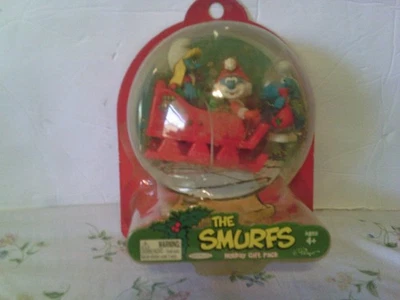 Paquete de regalo navideño de Los Pitufos Papá Pitufo Pitufina figuras bromas en trineo Foto 1 de 2