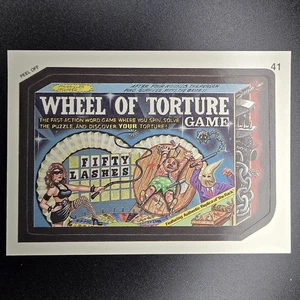 Topps Wacky Packages 1991 Peel Off Sticker Wheel Of Torture #41 - Picture 1 of 2