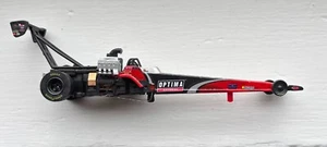 AUTO WORLD NHRA Top Fuel Dragster OPTIMA BATTERIES Black & Red HO Slot Car - Picture 1 of 11