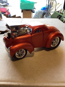 1941 Willys Coupe - Muscle Machines - 1:64 orange in Top Zustand - Bild 1 von 7