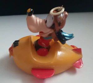 DE COLECCIÓN DISNEY "GOOFY - TRICKY RIDER" EN AVIÓN TIRAR CUERDA JUGUETE - Imagen 1 de 5