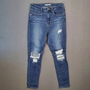 Pantalones de mezclilla para mujer Levi's 721 tiro alto ajustados desgastados talla 28 lavado medio - Imagen 1 de 11