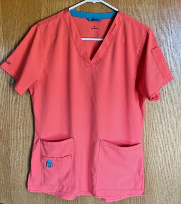 Blusa Médica Carhartt Force para Mujer Talla Pequeña Naranja Ajustada Bolsillos Elásticos Foto 1 de 4