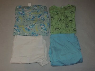 LOTE EXFOLIANTES USADOS 2 TOPS Y 2 FONDOS GRANDES; PERROS AZULES, BÚHOS VERDES, UA LANDAU Foto 1 de 4