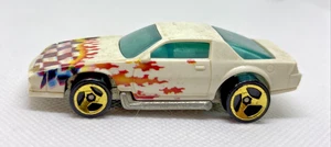 Coche fundido a presión Hot Wheels años 80 Chevy Camaro Z-28 dorado 7 radios - Imagen 1 de 8