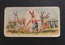 Antique EASTER Card from American Caramel Co. Dancing bunnies around egg card