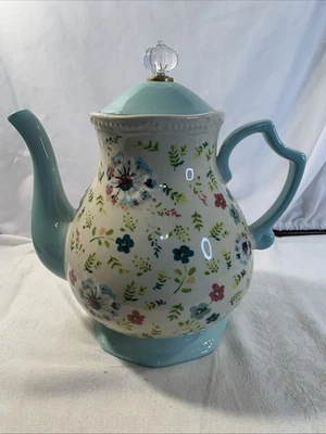 Tetera Pioneer Woman Kari 2,4 cuartos verde menta con diseño floral color crema Foto 1 de 4