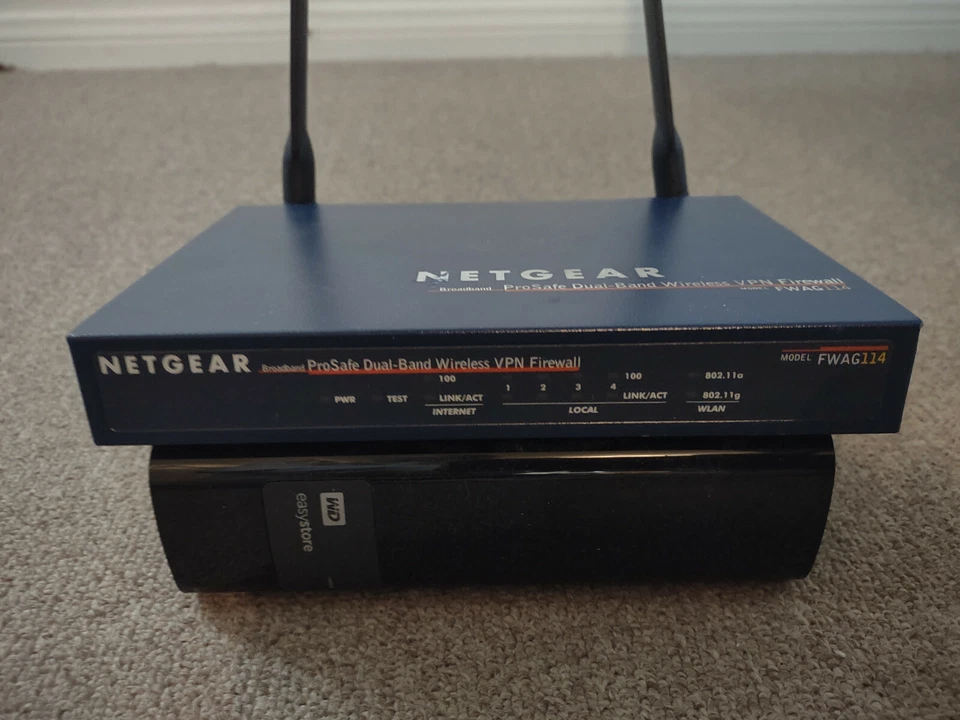 Netgear FR114P 100 Mbps 4-Port 10/100 Wireless Router (FR114PNA) - Image 1 of 1