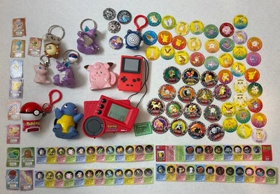 🔥MISC. LOTE POKEMON ANTIGO CHAVEIROS TIPO POG CALCULADORA DE MOEDAS E MUITO MAIS LOTE #2 - Imagem 1 de 4