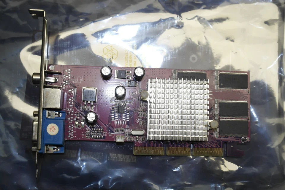 nVidia GeForce 4 MX 440 SE 64 MB AGP VGA S-video RCA Graphic Card passive purple - Image 1 of 4