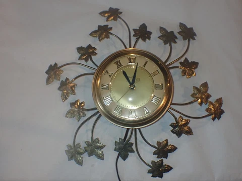 Vintage UNITED Electric Wall CLOCK Maple Leaves Metal WORKS Model 77 USA 1967 Cover