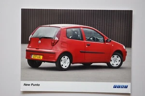 Car Press Photo - Fiat Punto - Red - Back / Side View - Picture 1 of 1
