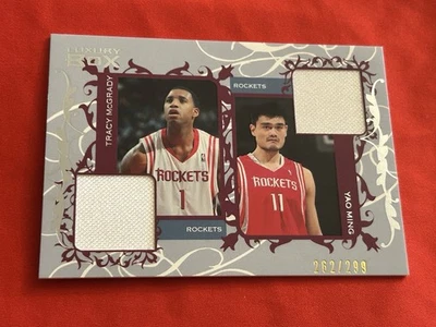 Tarjeta reliquia 2006-07 Topps Luxury Box Yao Ming & Tracy McGrady Courtside 262/299 Foto 1 de 4