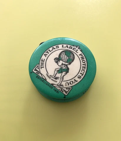 Vintage Celluloid Advertising Tape Measure The Atlas Label Protects You EST 1851 Cover