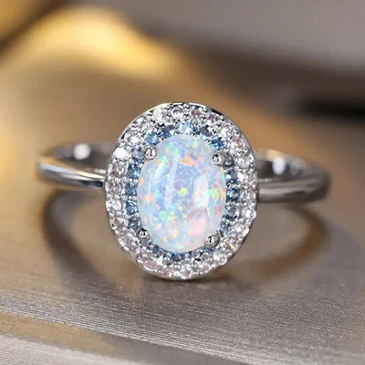 ANELLO ENGAGEMENT IN ORO BIANCO 18 KT. TIT. 750 CON OPALE, ZAFFIRI E BRILLANTI. - Imagen 1 de 4