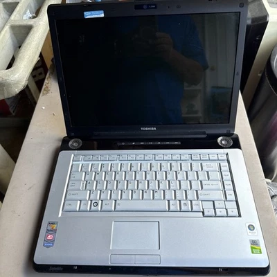 Toshiba Satellite A215-S4747 AMD Turion 64 X2 No Batt Windows Vista w/ Key As Is - Image 1 of 4
