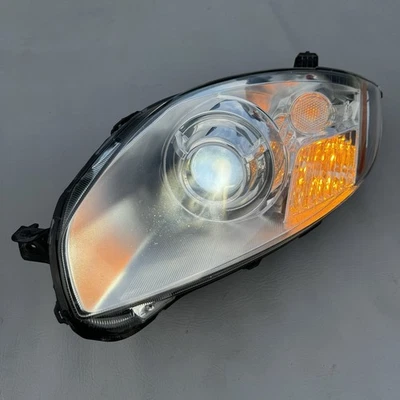Conjunto de faros HID de xenón lado izquierdo para conductor Mitsubishi Eclipse 2009-2012 OEM Foto 1 de 4
