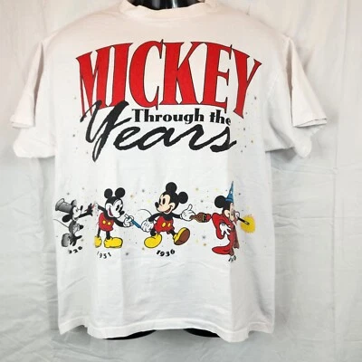 CAMISETA VINTAGE CON ESTAMPADO DE MICKEY MOUSE A TRAVÉS DE LOS AÑOS de Disney Designs Foto 1 de 4