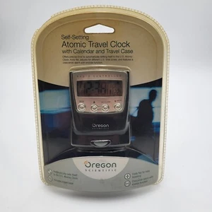Oregon Scientific Self-Setting Atomic Travel Clock with Calendar and Travel Case - Picture 1 of 8