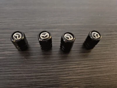 New Set of 4 Mazda  logo  valve stem covers black Metal Free Ship - Image 1 of 4