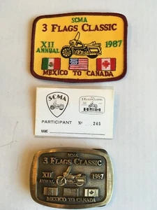 Fibbia, distintivo, toppa cintura moto SCMA 3 BANDIERE 1987 MESSICO TO CANADA - Foto 1 di 5