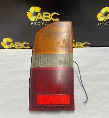 Conjunto de luz trasera izquierda Suzuki Sidekick 1989-1998 4 puertas LH 89-98 OEM Foto 1 de 4
