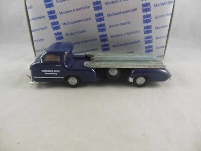 Conrad Ref. Mercedes Benz 1955 1034 coche de carreras transportador escala 1:43    Foto 1 de 4