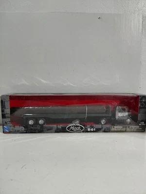 NIB New Ray DieCast 1:43 Mack B-61 Semi Truck Tractor & Flatbed Trailer w/Logs - Image 1 of 4