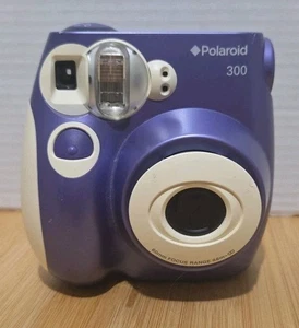 Mini cámara fotográfica instantánea Polaroid 300 Instax púrpura Polaroid - Imagen 1 de 4
