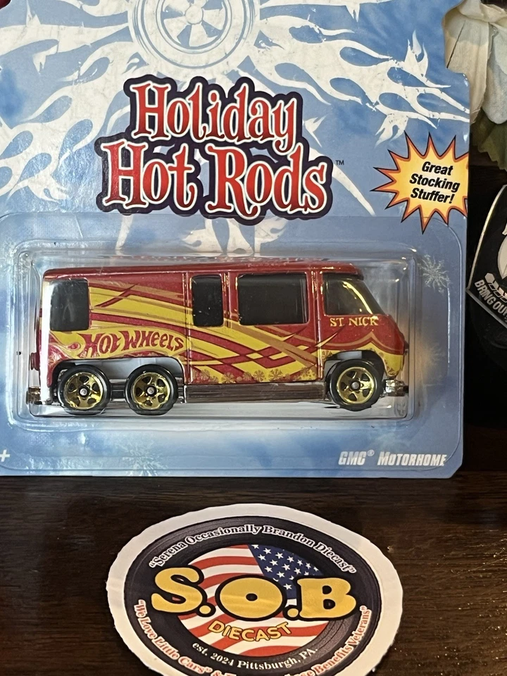 Autocaravana GMC Hot Wheels 1976 roja con llamas diecast sellada casi nueva Foto 1 de 4