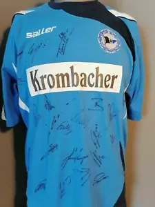 Arminia ⚽Bielefeld⚽Trikot XL Aufwärmshirt 2009 signiert KROMBACHER Fussball - Bild 1 von 3