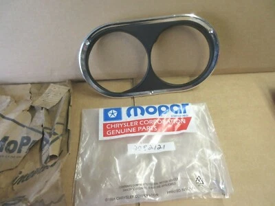 Mopar # 2082121 left head light bezel 1960, 1961, 1962 Plymouth Valiant, NOS - Image 1 of 3