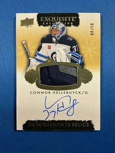 2023-24 UD THE CUP EXQUISITE CONNOR HELLEBUYCK JERSEY PATCH AUTO 08/50 - JETS - Picture 1 of 2