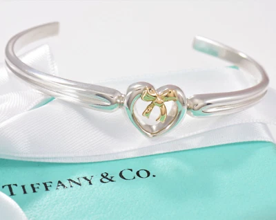 Tiffany & Co 18K Yellow Gold Silver Heart Bow Ribbon 6" Cuff Bracelet in Pouch - Image 1 of 4
