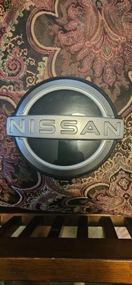 Insignia emblema iluminada Nissan Leaf 2023-2025 Foto 1 de 4