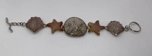 R.E.D. Sterling Silver Fossilized Sand Dollar & Coral Amber Sea Glass Bracelet - Picture 1 of 7