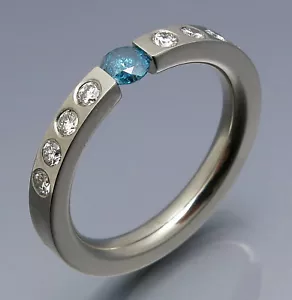 DISEÑO MADURO - ELEGANTE ANILLO TENSOR BRILLANTE 0,65 QUILATES - FINO ÚNICO - Imagen 1 de 5