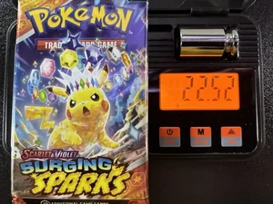 Pokemon Surging Sparks Booster Pack Sealed 22.52g 3.70mm - Picture 1 of 6