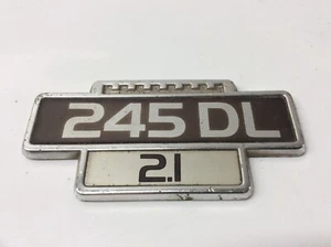 ORIGINAL VOLVO 245 DL 2.1 METAL CAR BADGE REASONABLE USED CONDITION FOR AGE - Picture 1 of 3
