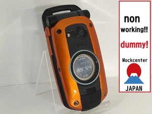 【Factice !】 Téléphone portable CASIO W42CA G-shock au-Japan (couleur orange) qui ne fonctionne pas - Photo 1 sur 3