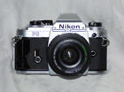 Vintage Nikon FG 35mm SLR Film Camera with accessories