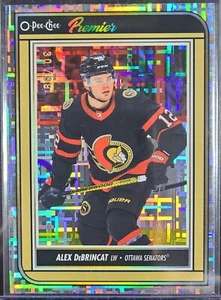 2022-23 OPC O-PEE-CHEE HOCKEY ALEX DeBRINCAT PREMIER DIAMOND RAINBOW FOIL #30/99 - Picture 1 of 2