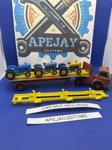 1 neuer Unterlegkeilhalter für Matchbox King Size Ford Traktor K-20 Transporter - Bild 1 von 5