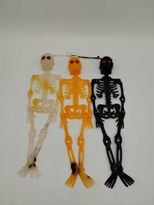 Scheletri in plastica morbida Halloween arancione nero bianco 10,5 pollici - Foto 1 di 7
