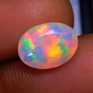 11x8mm Oval AAA Quality Faceted Ethiopian Opal Loose Calibrated Gemstone 1.75cts - Picture 1 of 4