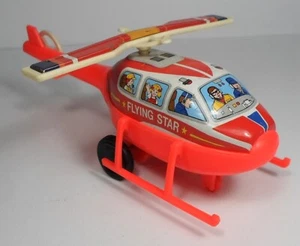 JIMMY TOYS 80's 7'' RED FLYING STAR HELICOPTER TIN & PLASTIC w/ SPINNING BLADES - Picture 1 of 10