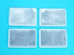 4 x GENUINO Earth Daxara BLANCO Autoadhesivo Stick On Reflector 57mm x 39mm - Imagen 1 de 1