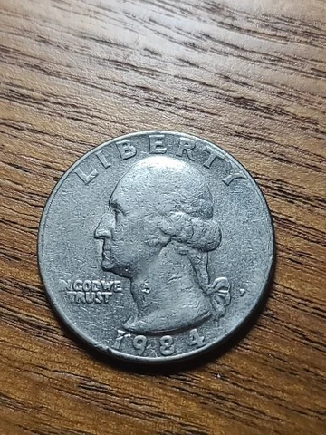 1984 P Quarter Strike error. In God We Trust Missing letters filled P off center Cover