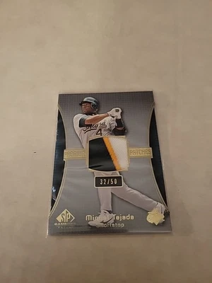 2004 SP Game Used Patch Premium Patch 32/50 Miguel Tejada #PP-MT Patch - Image 1 of 2